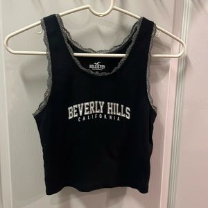 Hollister, small black tank top with gray trim “Beverly Hills California”